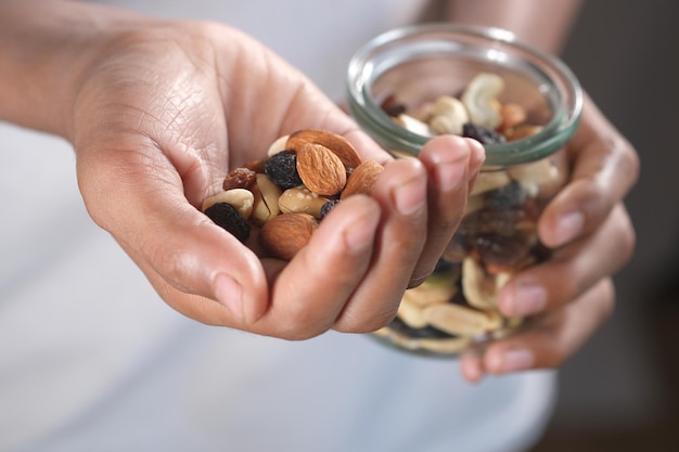 Young men eating mixed nut