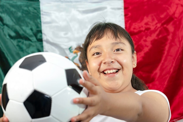 Young Mexican girl with Mexican flag