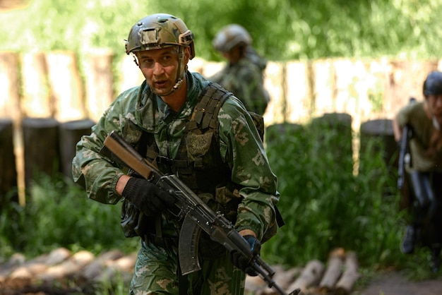 Young military soldiers during military maneuver training