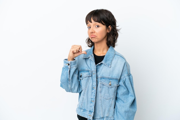 Young mixed race woman isolated on white background proud and selfsatisfied