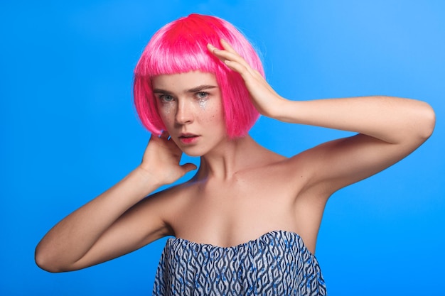 Young model in pink wig