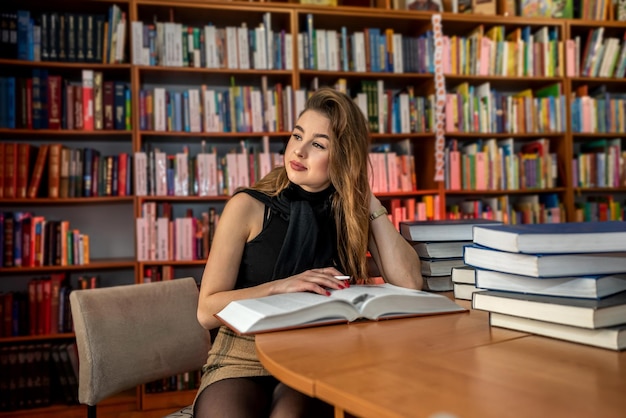 A young modest decent decently educated lady loves to visit the village library. Library concept