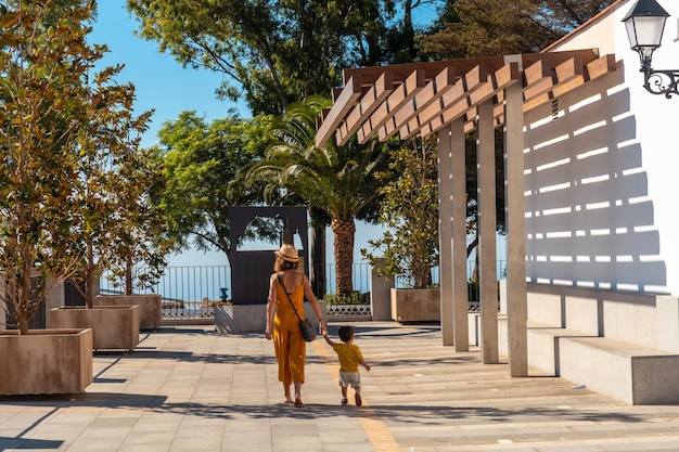 A young mother with her son in the municipality of Mijas in Malaga Andalusia