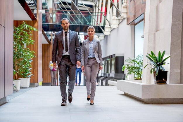 young multi ethnic business people group walking standing and top view