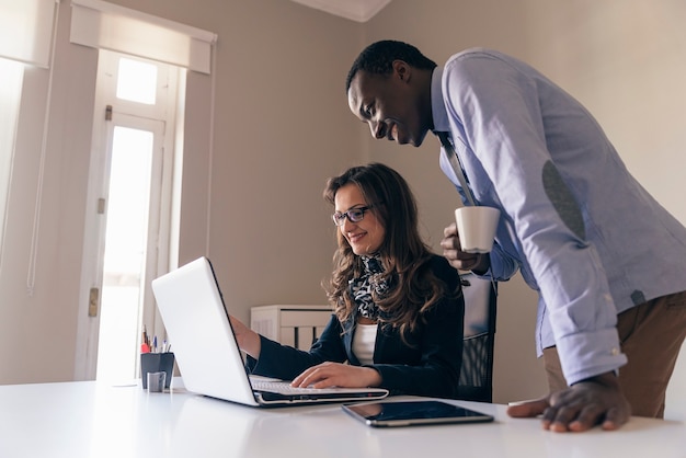 Young Multi-Ethnic Couple Working at the Office.