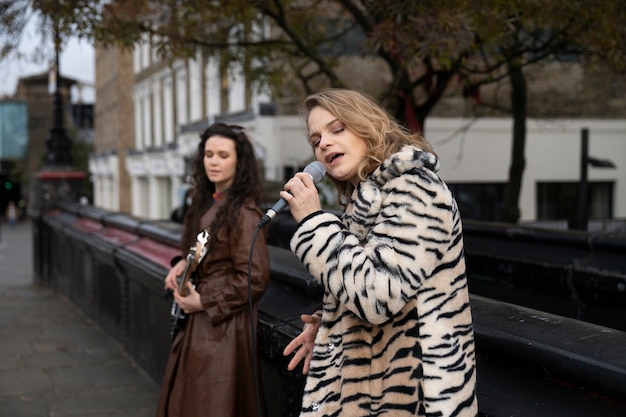 Young musicians singing around the city