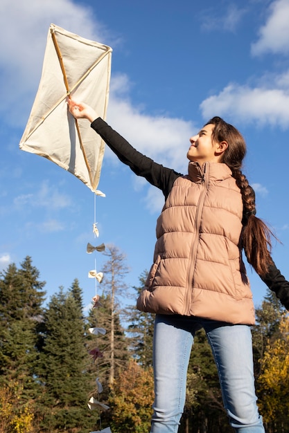 Young people getting their kite up