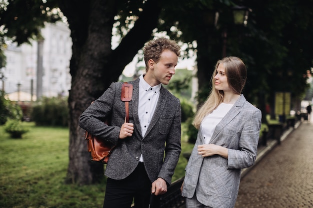 Young people having a business meeting outdoors