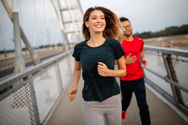 Young people running and exercising. Living healthy sporty lifestyle