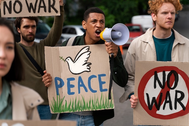 Young people taking part of anti war protest