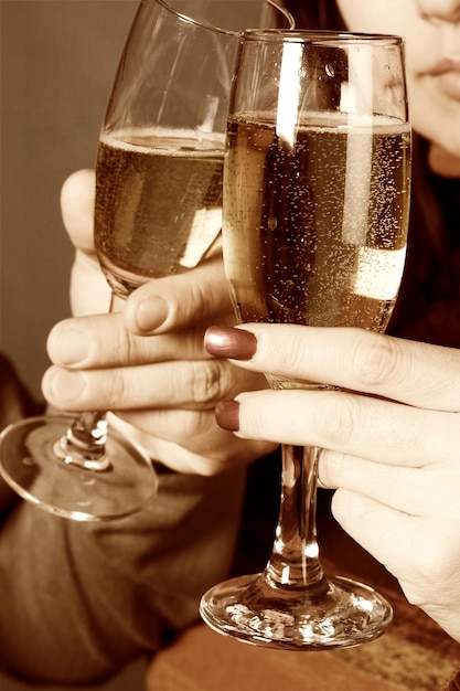 Young people with champagne glasses