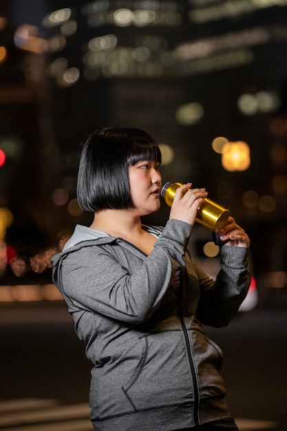 Young person getting ready for doing sport at night