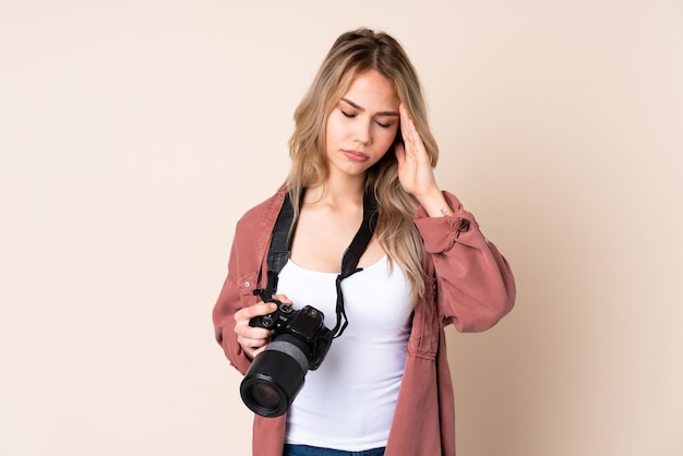 Young photographer woman with camera