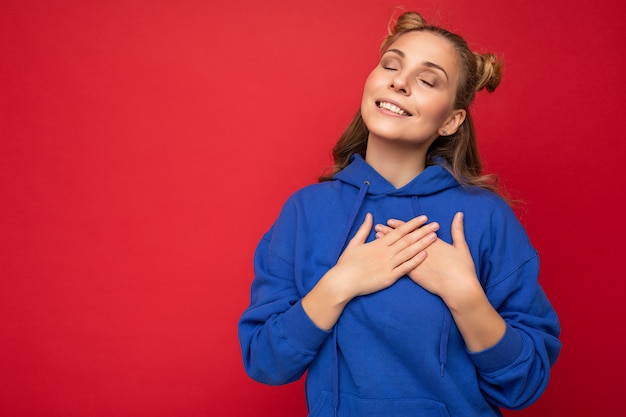 young positive happy smiling beautiful woman with sincere emotions wearing stylish clothes