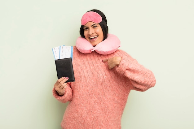 Young pretty hispanic woman flight passenger concept