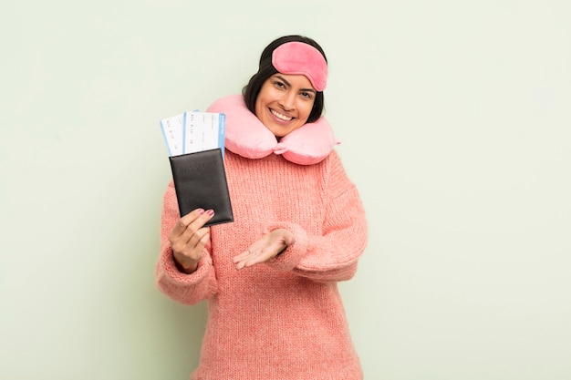 Young pretty hispanic woman flight passenger concept