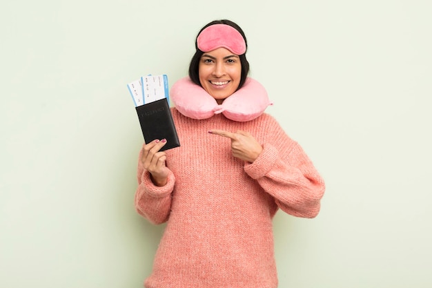 Young pretty hispanic woman flight passenger concept