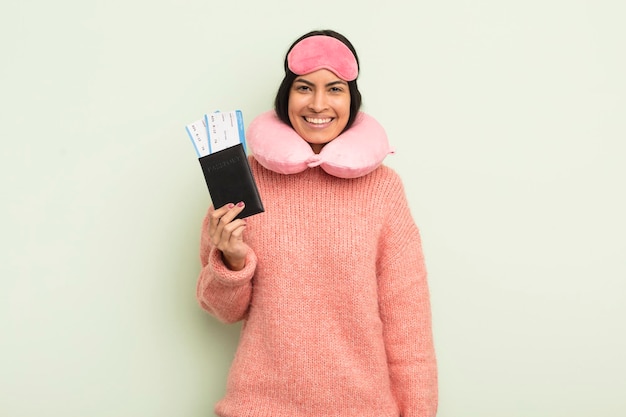 Young pretty hispanic woman flight passenger concept