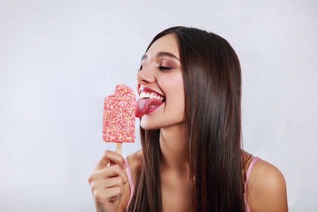 Young pretty indian woman. Stylish young woman with ice cream