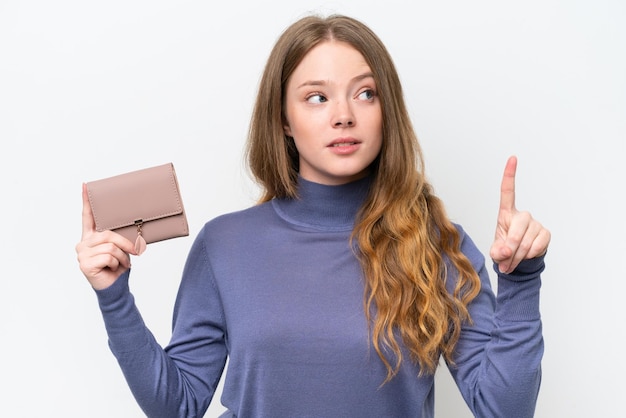 Young pretty woman holding wallet isolated on white background intending to realizes the solution while lifting a finger up