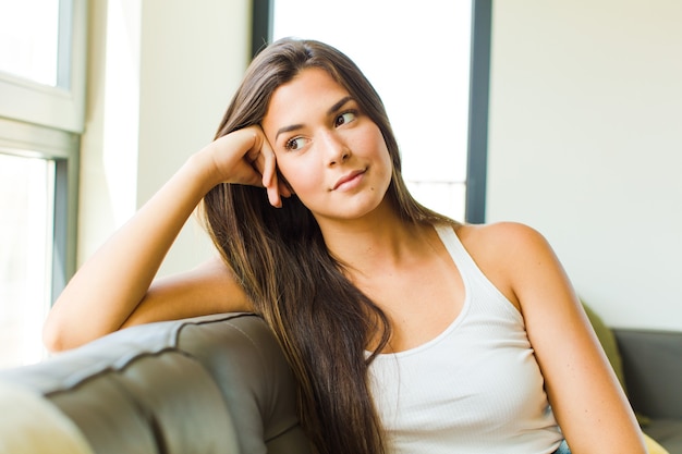 Young pretty woman relaxing at home