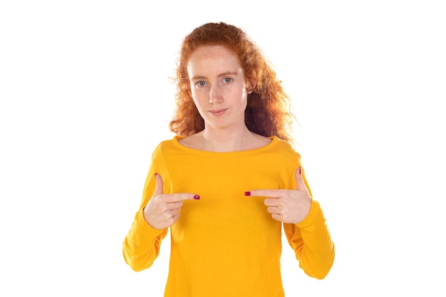 Young pretty woman smiling confidently pointing to herself positive relaxed satisfied attitude against white background