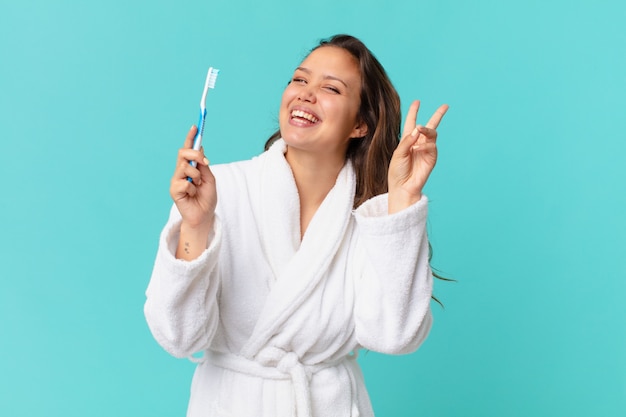 Young pretty woman wearing bathrobe