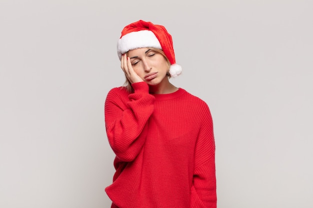 Young pretty woman wearing Christmas clothes