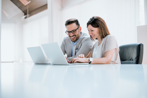 Young professionals in front of a computer