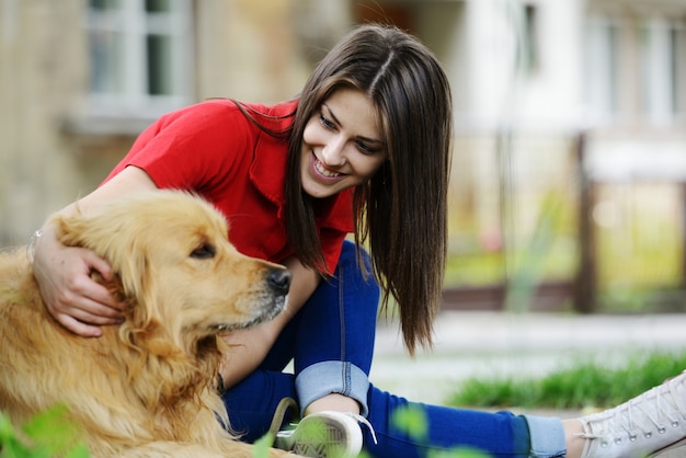 Young real people on the street with dog