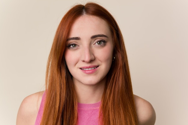 Young red hair woman face closeup isolated