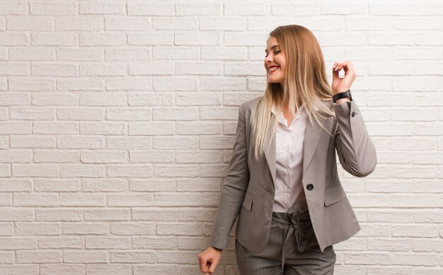 Photo young russian business woman dancing and having fun