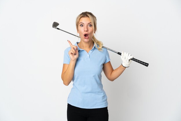 Young Russian golfer woman isolated on white wall intending to realizes the solution while lifting a finger up