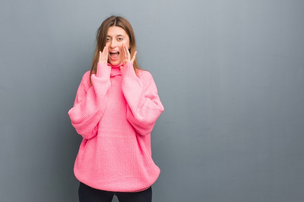 Young russian natural girl shouting something happy to the front