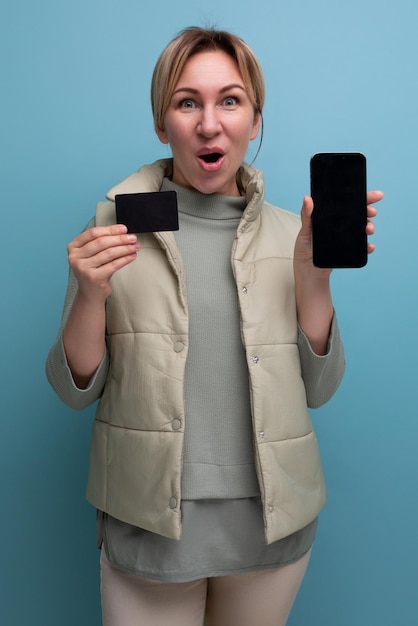 Young s woman bought a smartphone with a plastic card