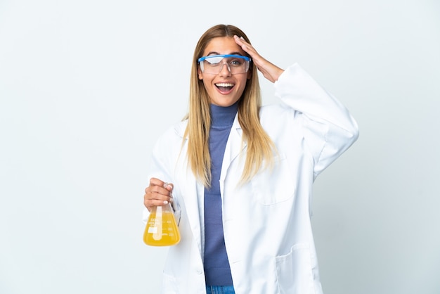 Young scientific woman isolated on white with surprise expression