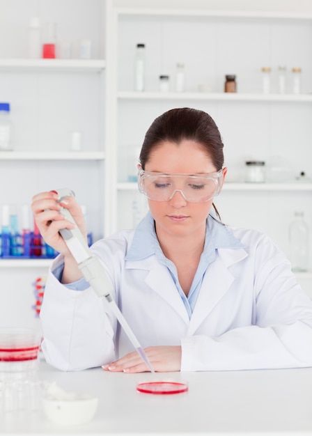 Young scientist preparing a sample