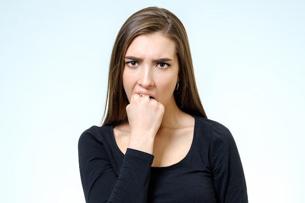 Young serious angry woman portrait