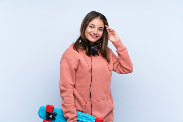 Young skater girl over isolated