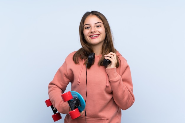 Young skater girl over isolated 