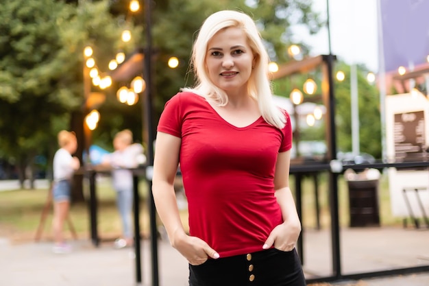 Young smiling woman portrait. Positive woman emotions concept.