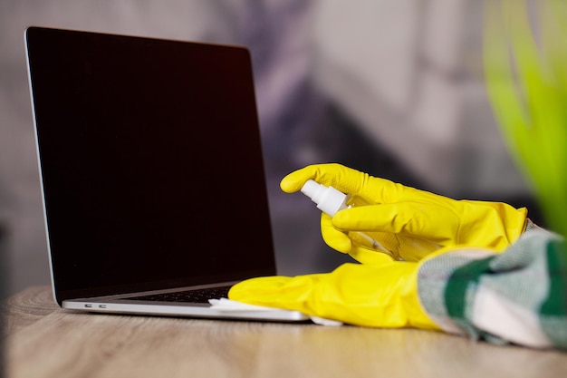 Young Smiling Woman in Yellow Gloves Cleaning House