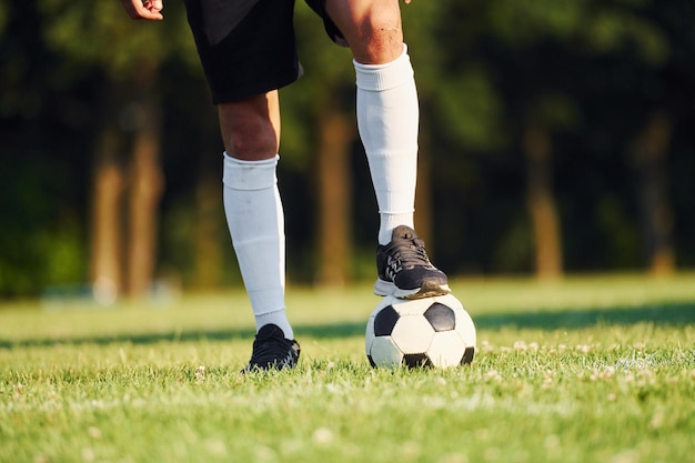 Young soccer player have training on the sportive field