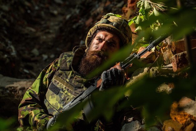 Young soldier with gun