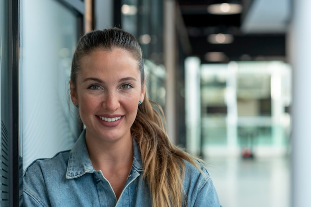 Young Spanish business woman smiling to camera