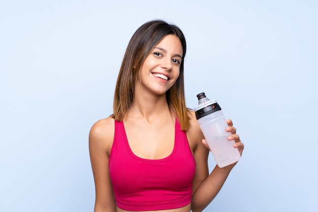 Young sport woman with sports water bottle