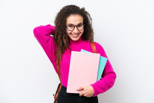 Young student Arab woman isolated on white background laughing