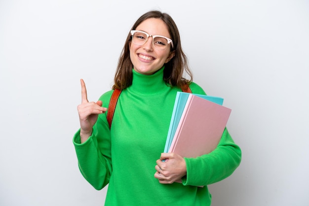 Young student caucasian woman isolated on white background pointing up a great idea