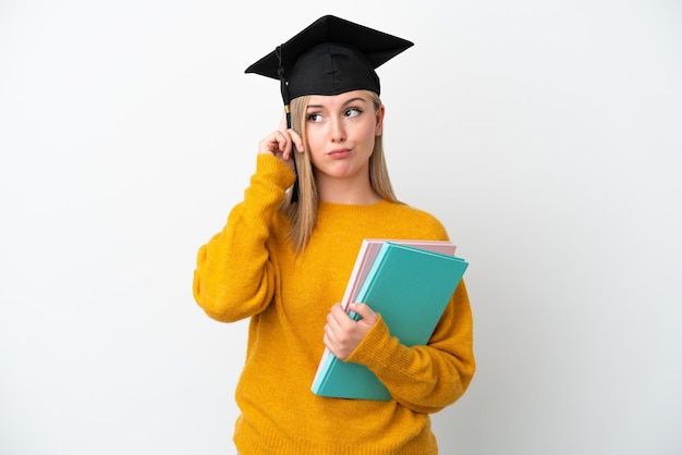 Young student caucasian woman isolated on white background thinking an idea