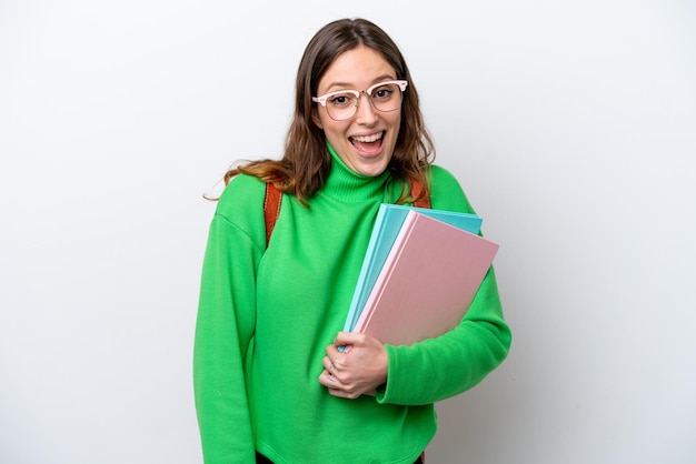 Young student caucasian woman isolated on white background with surprise and shocked facial expression